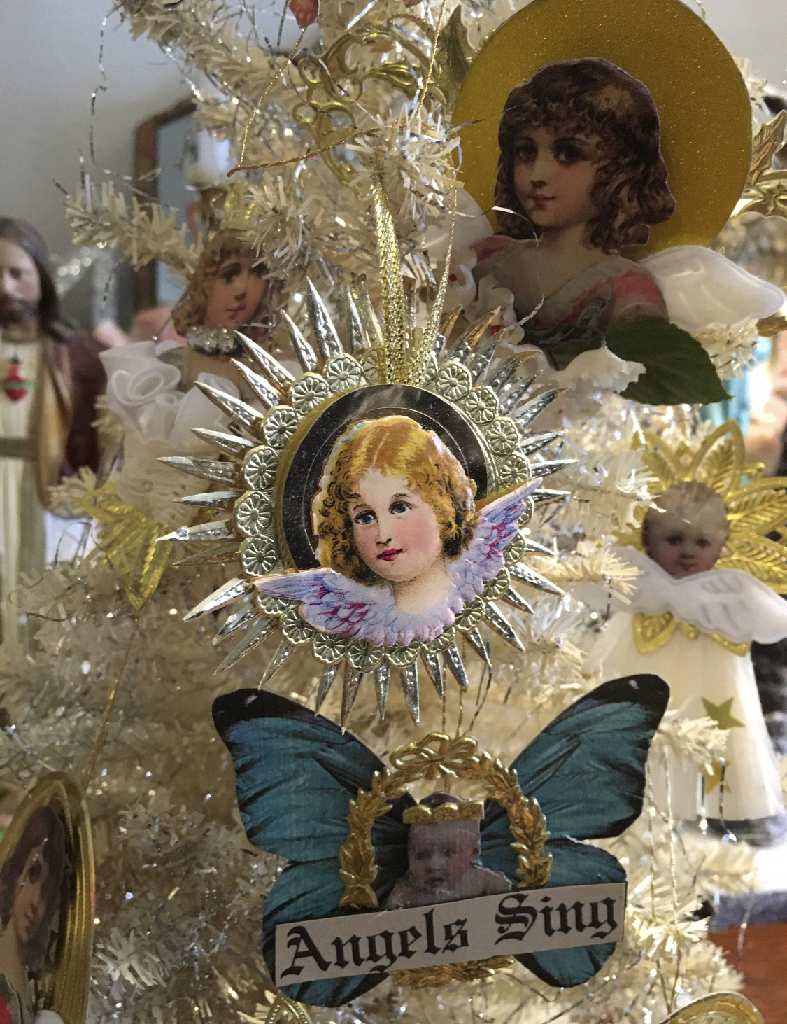 Susan Snyder's handcrafted Vimsey ornaments on a silver tree