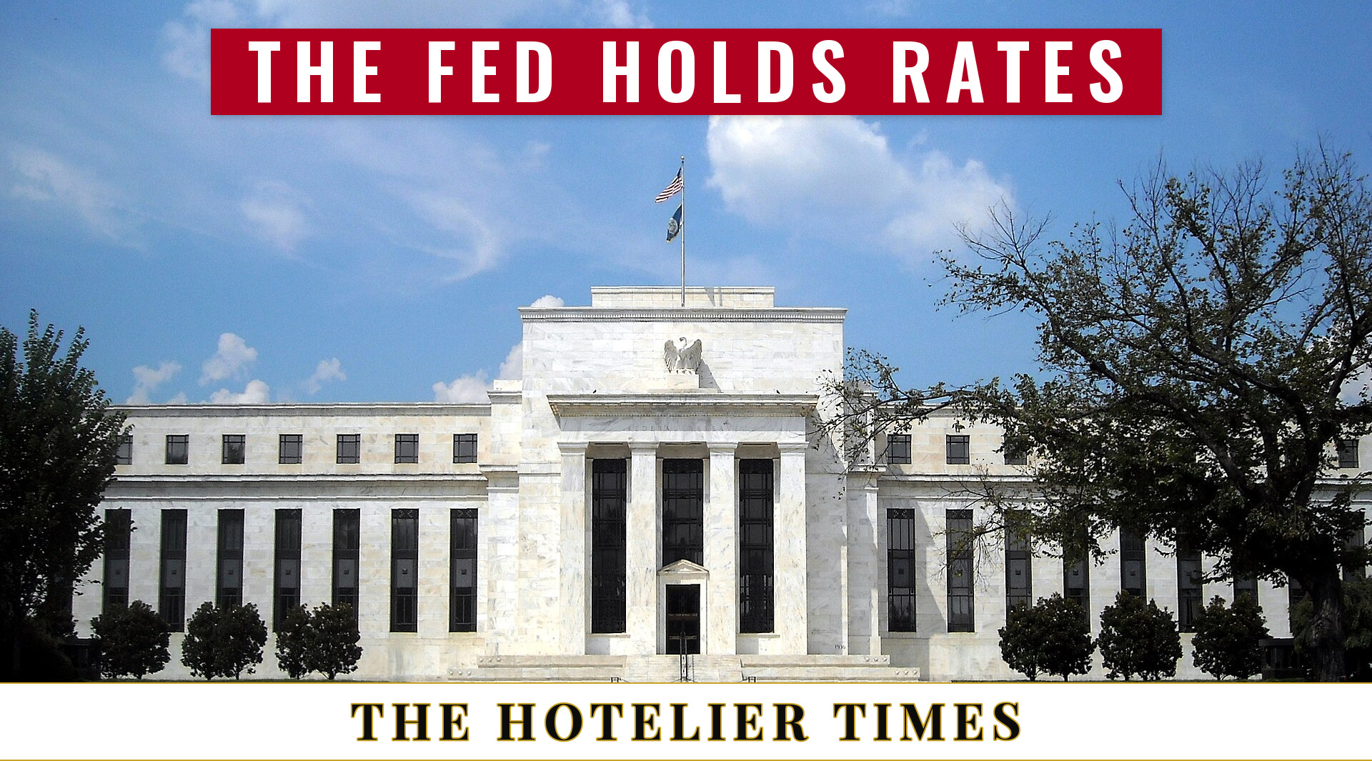 The Federal Reserve Eccles Building with the headline The Fed holds rates