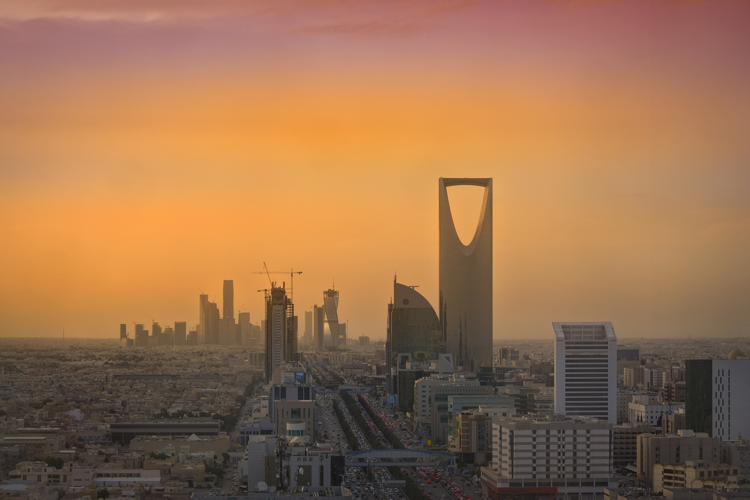 Riyadh skyline with the Kingdom Centre and King Abdullah Financial District at sunset